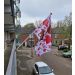 vlaggenstokhouder balkon bevestiging spijlenhek
