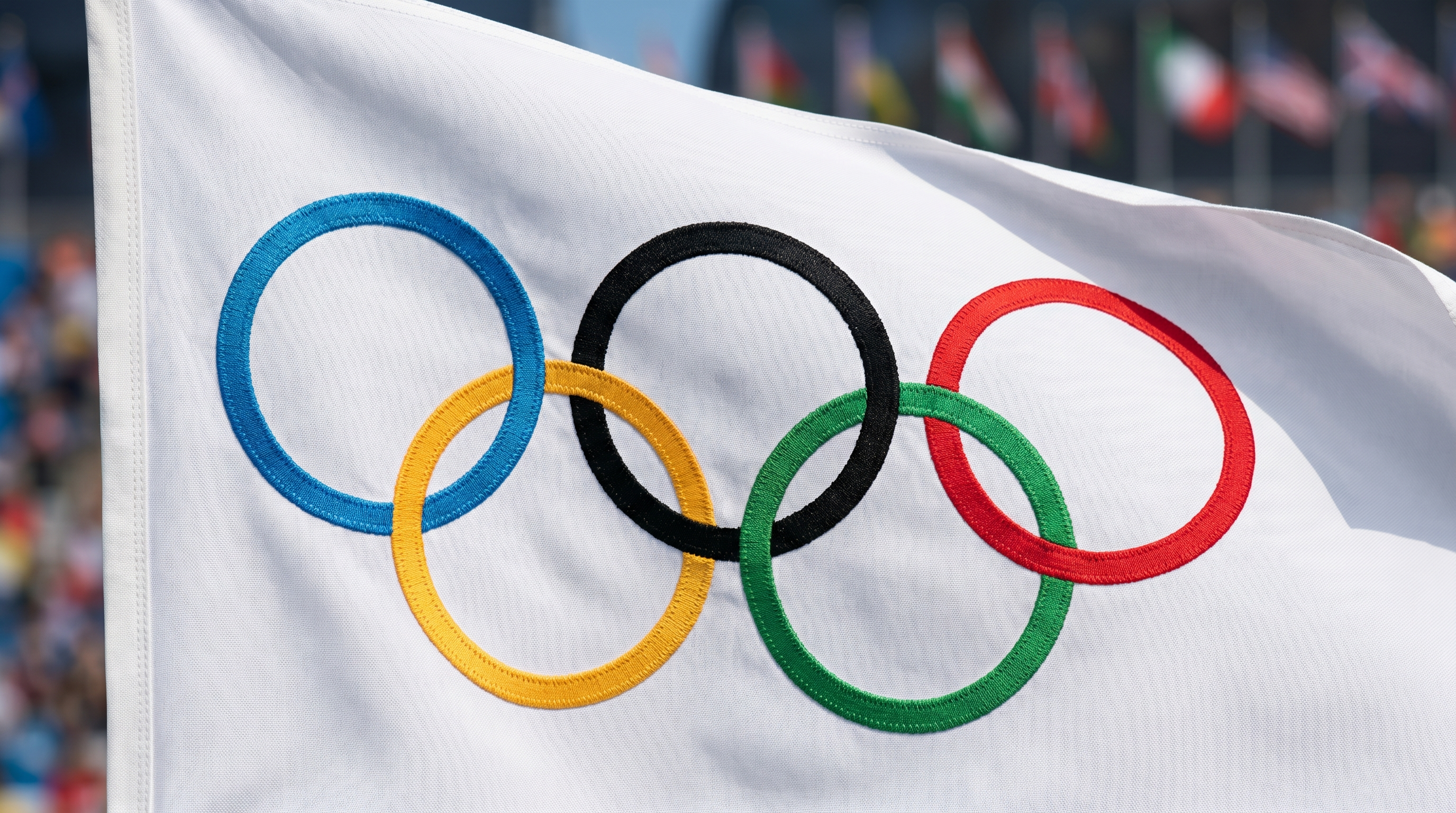 Wat betekenen de ringen op de Olympische vlag?